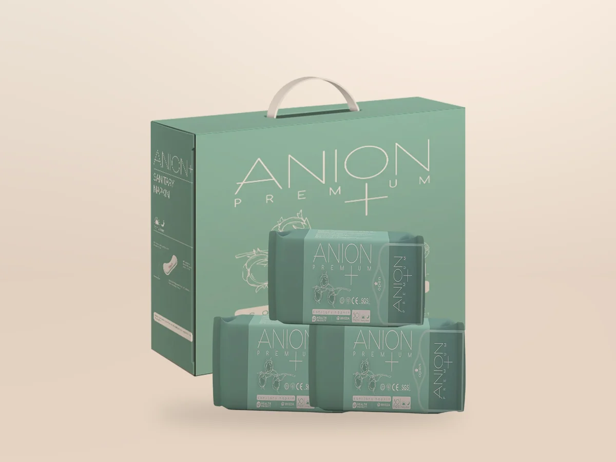 Box WHIEDA Anion Premium Anionen-Slipeinlagen und drei mintgrüne Packungen